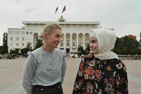 Nina Tseretilova and Maryam Gasanova in front of the administration of the city of Makhachkala, Dagestan. Girls fight against domestic violence in a Muslim region.