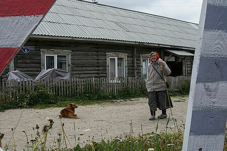 A local resident near her house, which used to be a workers’ barracks in a forced labor camp, Solovki