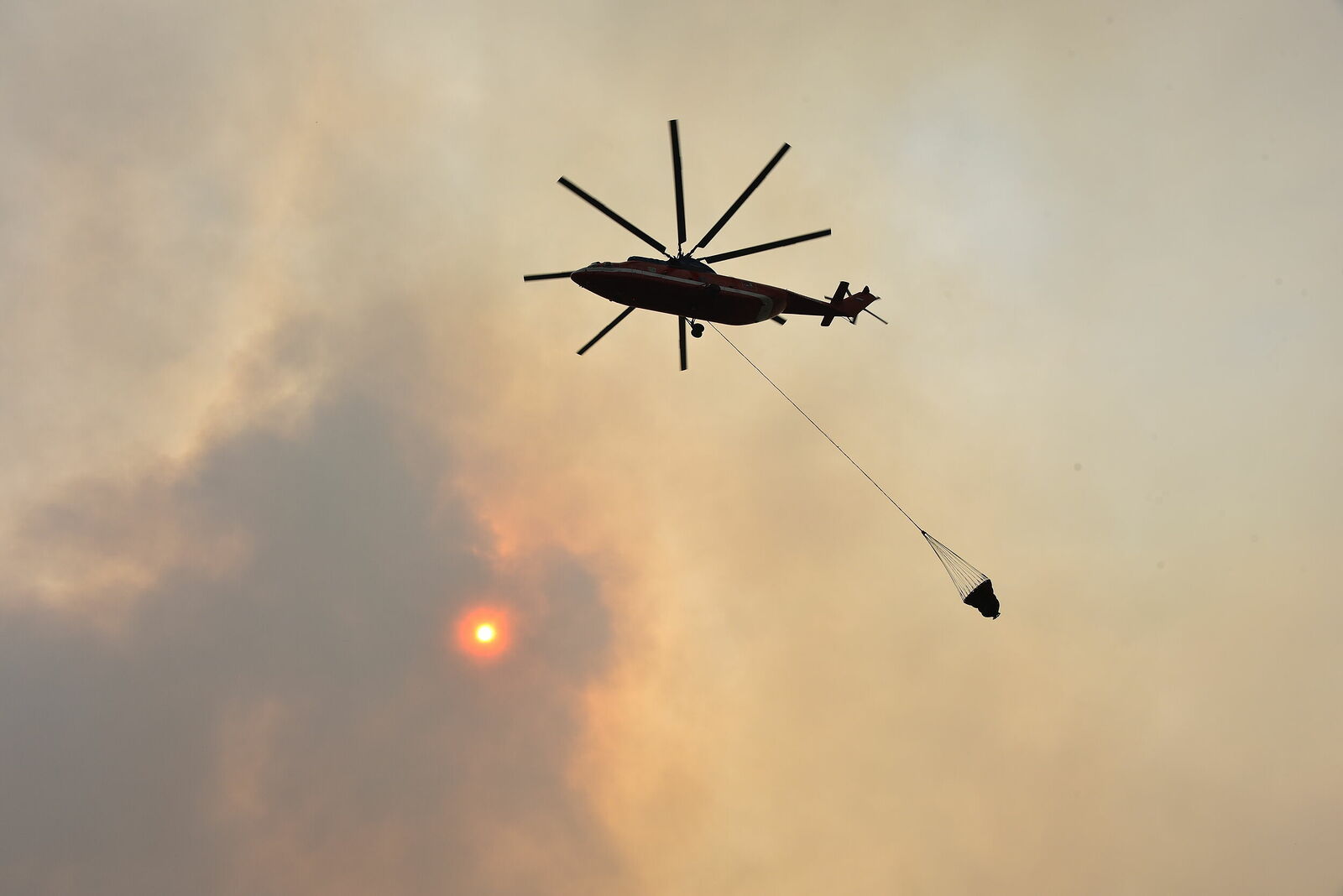 Photojournalist Anastasia Tsitsinova. Volunteer firefighters. Untitled Fighting a fire from the air